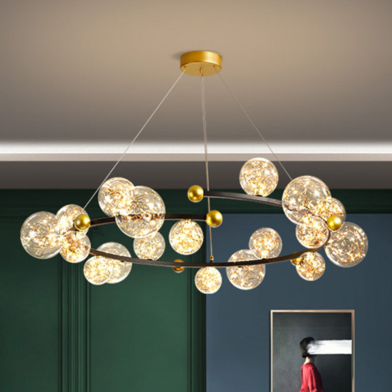 Clear Glass Orb Chandelier Lamp Contemporary LED Down Lighting with Glowing String 18 Gold-Black Clearhalo 'Ceiling Lights' 'Chandeliers' 'Glass shade' 'Glass' 'Modern Chandeliers' 'Modern' Lighting' 2025914