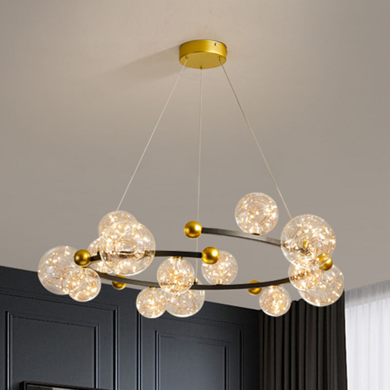 Clear Glass Orb Chandelier Lamp Contemporary LED Down Lighting with Glowing String 15 Gold-Black Clearhalo 'Ceiling Lights' 'Chandeliers' 'Glass shade' 'Glass' 'Modern Chandeliers' 'Modern' Lighting' 2025915