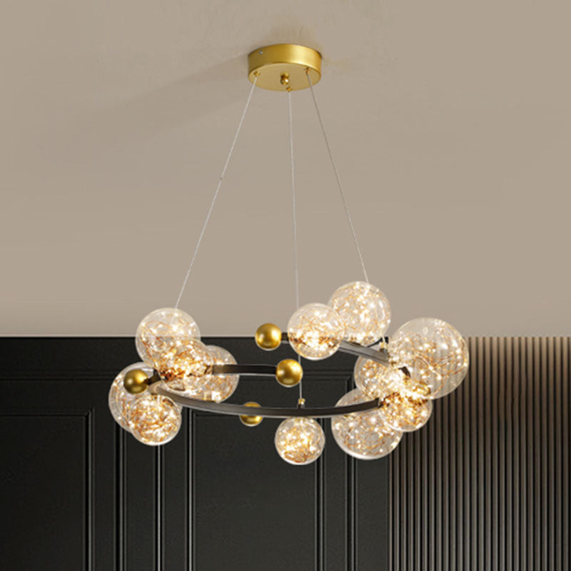 Clear Glass Orb Chandelier Lamp Contemporary LED Down Lighting with Glowing String 12 Gold-Black Clearhalo 'Ceiling Lights' 'Chandeliers' 'Glass shade' 'Glass' 'Modern Chandeliers' 'Modern' Lighting' 2025917
