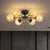 Simple LED Starry Semi Flush Mount Black Globe Ceiling Light Fixture with Glass Shade 6 Amber Clearhalo 'Ceiling Lights' 'Close To Ceiling Lights' 'Close to ceiling' 'Semi-flushmount' Lighting' 2026047