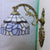 1 Light Bowl Wall Lamp Sconce Tiffany Style Blue Stained Art Glass Wall Lighting with Arched Arm Blue Clearhalo 'Art deco wall lights' 'Cast Iron' 'Glass' 'Industrial' 'Middle century wall lights' 'Modern' 'Tiffany wall lights' 'Tiffany' 'Traditional wall lights' 'Wall Lamps & Sconces' 'Wall Lights' Lighting' 2029228