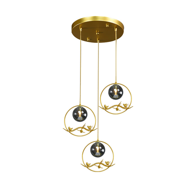 Globe Bedroom Pendant Light Vintage Smoke Gray/Clear/Amber Glass 1/3 Lights Brass Hanging Light with Round/Linear Canopy Clearhalo 'Ceiling Lights' 'Chandeliers' 'Glass shade' 'Glass' 'Pendant Lights' 'Pendants' Lighting' 203575