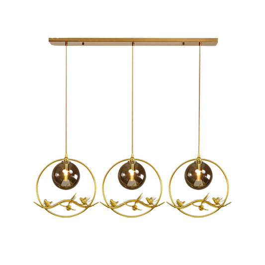Globe Bedroom Pendant Light Vintage Smoke Gray/Clear/Amber Glass 1/3 Lights Brass Hanging Light with Round/Linear Canopy Clearhalo 'Ceiling Lights' 'Chandeliers' 'Glass shade' 'Glass' 'Pendant Lights' 'Pendants' Lighting' 203582
