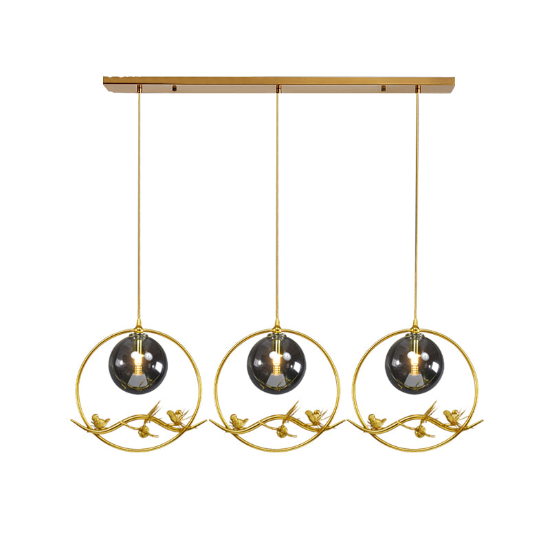Globe Bedroom Pendant Light Vintage Smoke Gray/Clear/Amber Glass 1/3 Lights Brass Hanging Light with Round/Linear Canopy Clearhalo 'Ceiling Lights' 'Chandeliers' 'Glass shade' 'Glass' 'Pendant Lights' 'Pendants' Lighting' 203585