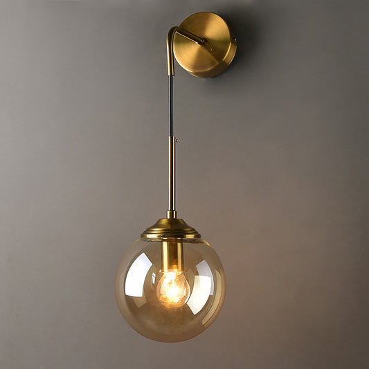 Globe Glass Wall Mount Light Fixture Contemporary 1 Head Gold Wall Lighting for Bedroom Gold Amber Clearhalo 'Cast Iron' 'Glass' 'Industrial' 'Modern wall lights' 'Modern' 'Tiffany' 'Traditional wall lights' 'Wall Lamps & Sconces' 'Wall Lights' Lighting' 2038872