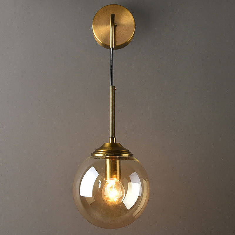Globe Glass Wall Mount Light Fixture Contemporary 1 Head Gold Wall Lighting for Bedroom Clearhalo 'Cast Iron' 'Glass' 'Industrial' 'Modern wall lights' 'Modern' 'Tiffany' 'Traditional wall lights' 'Wall Lamps & Sconces' 'Wall Lights' Lighting' 2038873