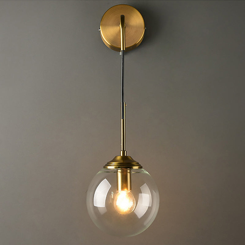 Globe Glass Wall Mount Light Fixture Contemporary 1 Head Gold Wall Lighting for Bedroom Clearhalo 'Cast Iron' 'Glass' 'Industrial' 'Modern wall lights' 'Modern' 'Tiffany' 'Traditional wall lights' 'Wall Lamps & Sconces' 'Wall Lights' Lighting' 2038877