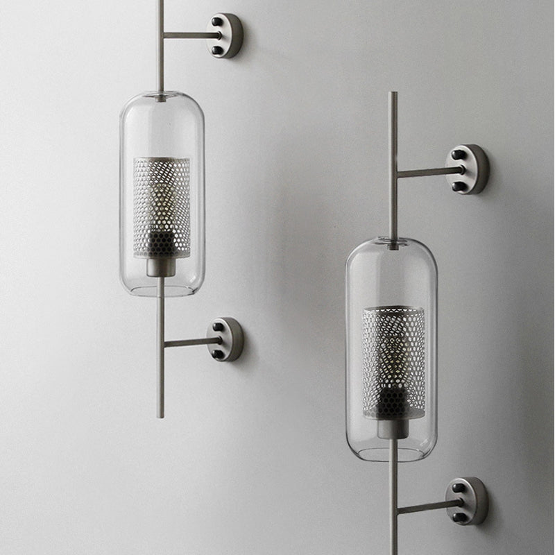 Pill Capsule Wall Lighting Fixture Modernism Clear Glass 1-Bulb Bathroom Wall Lamp Sconce with Inside Mesh Screen Clearhalo 'Cast Iron' 'Glass' 'Industrial' 'Modern wall lights' 'Modern' 'Tiffany' 'Traditional wall lights' 'Wall Lamps & Sconces' 'Wall Lights' Lighting' 2038981