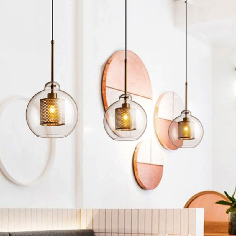 Clear Glass Orb Pendant Lighting Modernity 1 Head Hanging Ceiling Light with Inside Mesh Cage Bronze B Clearhalo 'Ceiling Lights' 'Glass shade' 'Glass' 'Modern Pendants' 'Modern' 'Pendant Lights' 'Pendants' Lighting' 2039051