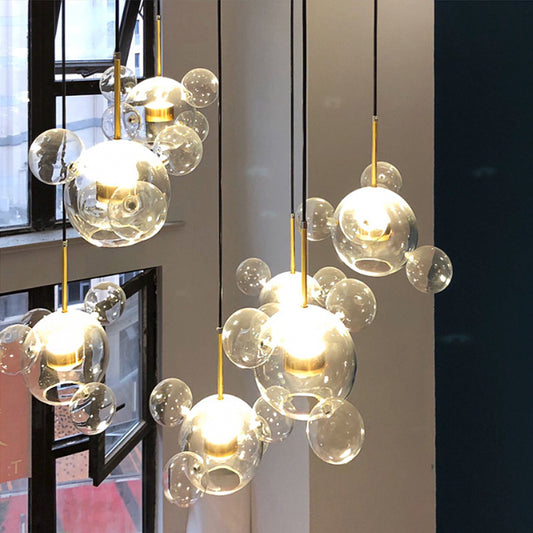 Brass Bubble Cluster Pendant Light Minimal 5 Heads Clear Glass Ceiling Suspension Lamp Clearhalo 'Ceiling Lights' 'Glass shade' 'Glass' 'Island Lights' 'Modern Pendants' 'Modern' 'Pendant Lights' 'Pendants' Lighting' 2039068