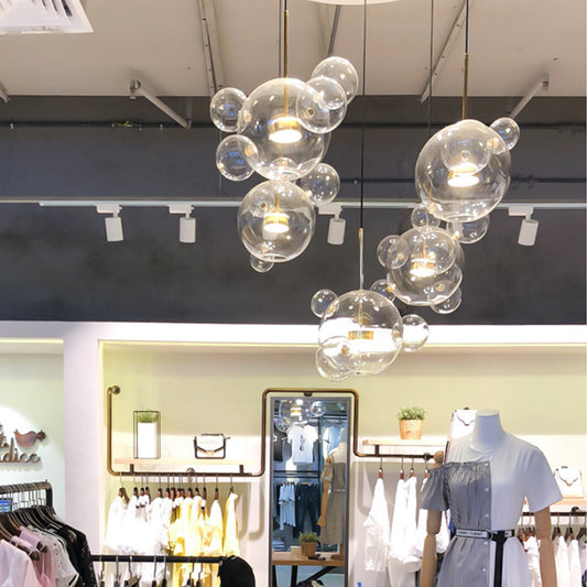 Brass Bubble Cluster Pendant Light Minimal 5 Heads Clear Glass Ceiling Suspension Lamp Clearhalo 'Ceiling Lights' 'Glass shade' 'Glass' 'Island Lights' 'Modern Pendants' 'Modern' 'Pendant Lights' 'Pendants' Lighting' 2039070