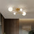 Orb Semi Mount Lighting Simple Opaline Glass Living Room Close to Ceiling Lamp in Gold 4 Gold Clearhalo 'Ceiling Lights' 'Close To Ceiling Lights' 'Close to ceiling' 'Glass shade' 'Glass' 'Semi-flushmount' Lighting' 2039260
