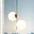 Nordic 2 Lights Chandelier Lighting Gold Sphere Pendant Light Kit with Opal Glass Shade Gold Clearhalo 'Ceiling Lights' 'Chandeliers' 'Glass shade' 'Glass' 'Modern Chandeliers' 'Modern' Lighting' 2039324