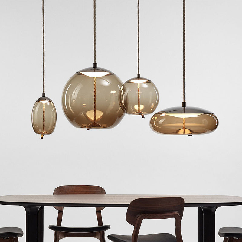 Geometry Amber Glass Suspension Lamp Contemporary 1-Light Pendant Lighting Fixture for Dining Room Clearhalo 'Ceiling Lights' 'Chandeliers' 'Glass shade' 'Glass' 'Modern Pendants' 'Modern' 'Pendant Lights' 'Pendants' Lighting' 2039547
