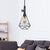 1-Light Hanging Ceiling Light Village Diamond Metal Cage Wrought Iron Pendant Light Fixture in Black/Weathered Copper/Gold for Living Room Black Clearhalo 'Art Deco Pendants' 'Black' 'Cast Iron' 'Ceiling Lights' 'Ceramic' 'Crystal' 'Industrial Pendants' 'Industrial' 'Metal' 'Middle Century Pendants' 'Pendant Lights' 'Pendants' 'Rustic Pendants' 'Tiffany' Lighting' 204172