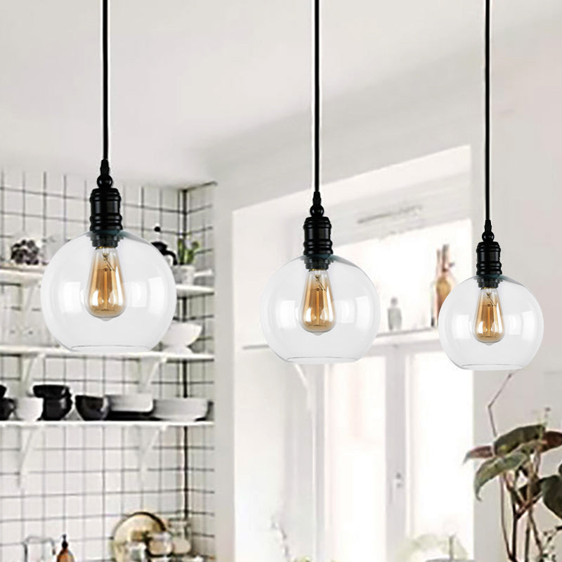 Clear Glass Shade Black Pendant Globe/Bell 1-Light Industrial Hanging Light Fixture for Kitchen Black Globe Clearhalo 'Ceiling Lights' 'Glass shade' 'Glass' 'Industrial Pendants' 'Industrial' 'Middle Century Pendants' 'Pendant Lights' 'Pendants' 'Tiffany' Lighting' 205170