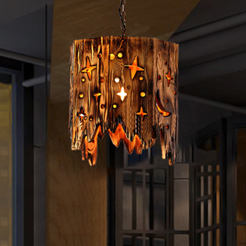 Vintage Cylinder Hanging Ceiling Light 1 Light Wood Pendant Lighting in Bronze with Etched Star Brown Clearhalo 'Ceiling Lights' 'Industrial Pendants' 'Industrial' 'Middle Century Pendants' 'Pendant Lights' 'Pendants' 'Tiffany' Lighting' 205850