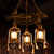 Bronze 3 Lights Chandelier Light Fixture Coastal Clear Glass Kerosene Pendant Lamp Antique Bronze Clearhalo 'Cast Iron' 'Ceiling Lights' 'Chandeliers' 'Industrial Chandeliers' 'Industrial' 'Metal' 'Middle Century Chandeliers' 'Rustic Chandeliers' 'Tiffany' Lighting' 205858