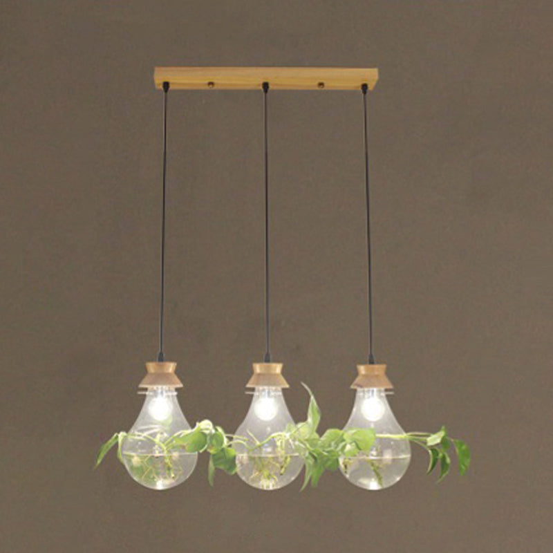 Clear Glass Bulb Shaped Suspension Lighting Rustic 3 Heads Restaurant Planter Multi Lamp Pendant Light 3 Wood Linear Clearhalo 'Ceiling Lights' 'Close To Ceiling Lights' 'Glass shade' 'Glass' 'Industrial Pendants' 'Industrial' 'Middle Century Pendants' 'Pendant Lights' 'Pendants' 'Tiffany' Lighting' 2064000