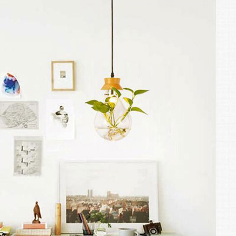 Clear Glass Bulb Shaped Suspension Lighting Rustic 3 Heads Restaurant Planter Multi Lamp Pendant Light Clearhalo 'Ceiling Lights' 'Close To Ceiling Lights' 'Glass shade' 'Glass' 'Industrial Pendants' 'Industrial' 'Middle Century Pendants' 'Pendant Lights' 'Pendants' 'Tiffany' Lighting' 2064004