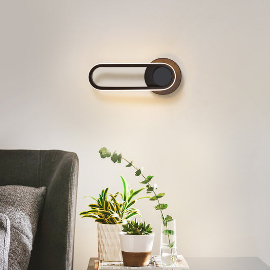 Oval Shaped Living Room Wall Sconce Light Metal Minimalist LED Wall Mount Lighting Black Clearhalo 'Cast Iron' 'Glass' 'Industrial' 'Modern wall lights' 'Modern' 'Tiffany' 'Traditional wall lights' 'Wall Lamps & Sconces' 'Wall Lights' Lighting' 2064343