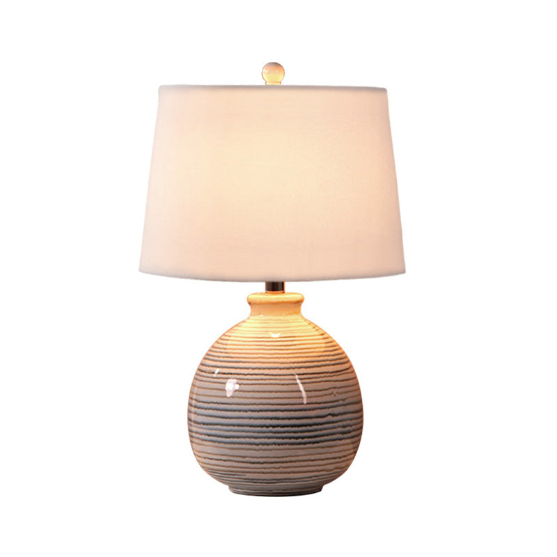 Artistic Tapered Drum Shaped Table Lamp Fabric 1 Bulb Bedside Nightstand Light with Ceramic Base Clearhalo 'Lamps' 'Table Lamps' Lighting' 2064500