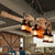 6-Light Clear Glass Hanging Chandelier Coastal Brown Lantern Living Room Pendant Light Fixture with Wooden Instrument Brown A Clearhalo 'Carpenter Chandeliers' 'Ceiling Lights' 'Chandeliers' 'Industrial Chandeliers' 'Industrial' 'Middle Century Chandeliers' 'Modern' 'Tiffany' Lighting' 207700