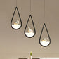 Waterdrop Frame Hanging Lamp Acrylic 1/2/3 Lights Black/White Ceiling Pendant for Dining Room in Warm/White Light Clearhalo 'Ceiling Lights' 'Modern Pendants' 'Modern' 'Pendant Lights' 'Pendants' Lighting' 208733
