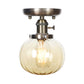 1 Light Globe/Round Semi Flush Light Industrial Bronze Clear/Amber Glass Lighting Fixture for Indoor Clearhalo 'Ceiling Lights' 'Close To Ceiling Lights' 'Close to ceiling' 'Glass shade' 'Glass' 'Semi-flushmount' Lighting' 209363