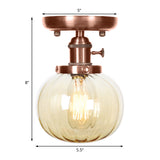 Globe/Round Clear/Amber Glass Semi Mount Lighting Industrial 1 Bulb Living Room Ceiling Light in Copper Clearhalo 'Ceiling Lights' 'Close To Ceiling Lights' 'Close to ceiling' 'Glass shade' 'Glass' 'Semi-flushmount' Lighting' 209470