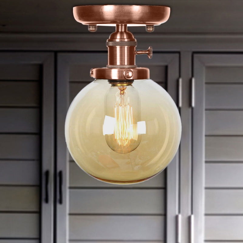 Globe/Round Clear/Amber Glass Semi Mount Lighting Industrial 1 Bulb Living Room Ceiling Light in Copper Clearhalo 'Ceiling Lights' 'Close To Ceiling Lights' 'Close to ceiling' 'Glass shade' 'Glass' 'Semi-flushmount' Lighting' 209471