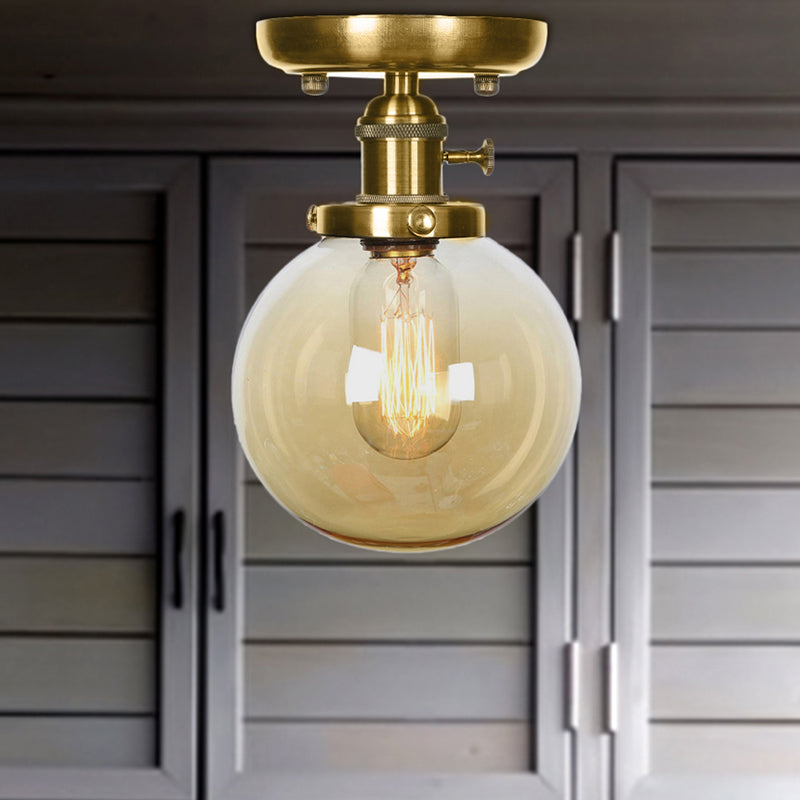 Bronze Globe/Round Semi Flush Light Industrial Clear/Amber Glass 1 Light Living Room Ceiling Lighting Fixture Amber Globe Clearhalo 'Ceiling Lights' 'Close To Ceiling Lights' 'Close to ceiling' 'Glass shade' 'Glass' 'Semi-flushmount' Lighting' 209525