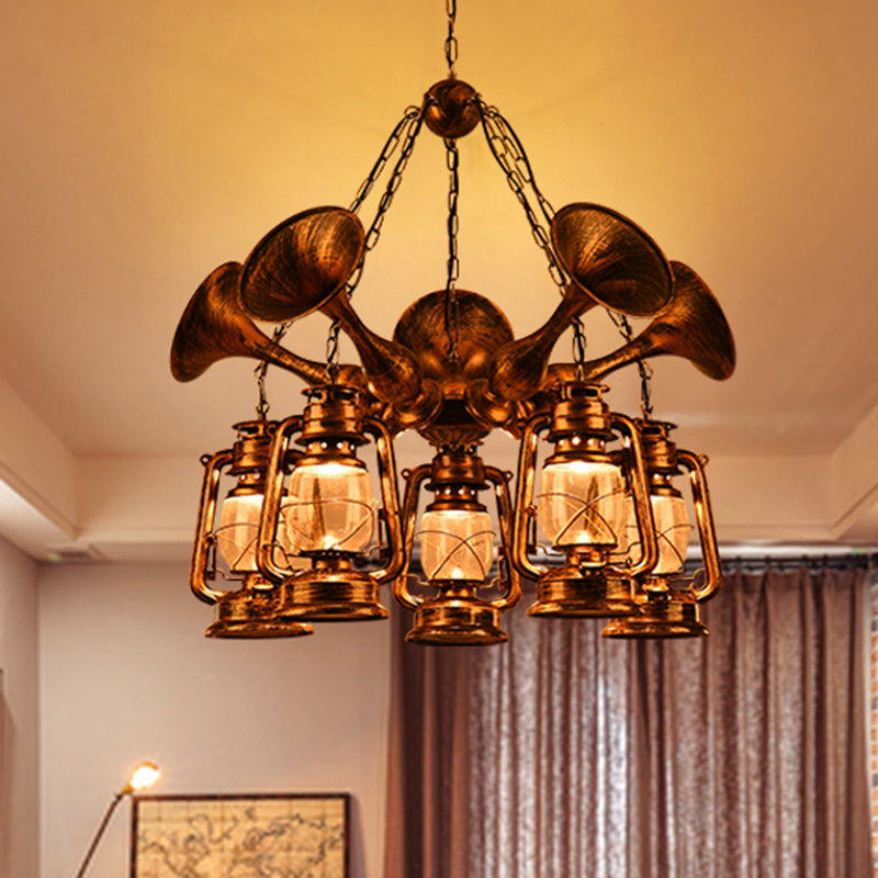 Lantern Shade Ceiling Lamp 3/5 Bulb Clear Glass Coastal Dining Room Chandelier Pendant Light in Antique Brass 5 Antique Brass Clearhalo 'Cast Iron' 'Ceiling Lights' 'Chandeliers' 'Industrial Chandeliers' 'Industrial' 'Metal' 'Middle Century Chandeliers' 'Rustic Chandeliers' 'Tiffany' Lighting' 209789