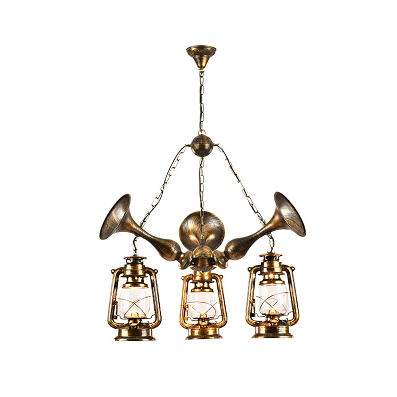 Lantern Shade Ceiling Lamp 3/5 Bulb Clear Glass Coastal Dining Room Chandelier Pendant Light in Antique Brass Clearhalo 'Cast Iron' 'Ceiling Lights' 'Chandeliers' 'Industrial Chandeliers' 'Industrial' 'Metal' 'Middle Century Chandeliers' 'Rustic Chandeliers' 'Tiffany' Lighting' 209795