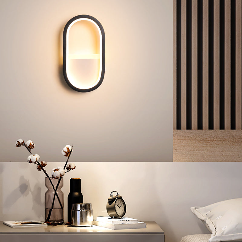 Oval Wall Light Fixture Contemporary Acrylic Black/White LED Wall Sconce in Warm/White Light Black Clearhalo 'Modern wall lights' 'Modern' 'Wall Lamps & Sconces' 'Wall Lights' Lighting' 210068