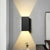Cuboid Up and Down LED Wall Sconce Contemporary Metal Gold/Coffee/Grey Sconce Light Fixture for Bedroom Black Clearhalo 'Cast Iron' 'Glass' 'Industrial' 'Modern wall lights' 'Modern' 'Tiffany' 'Traditional wall lights' 'Wall Lamps & Sconces' 'Wall Lights' Lighting' 210954