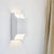 1 Light Bedroom Up and Down LED Wall Sconce with Geometric Metal Shade Black/Grey/White Wall Mount Light White Clearhalo 'Cast Iron' 'Glass' 'Industrial' 'Modern wall lights' 'Modern' 'Tiffany' 'Traditional wall lights' 'Wall Lamps & Sconces' 'Wall Lights' Lighting' 211109