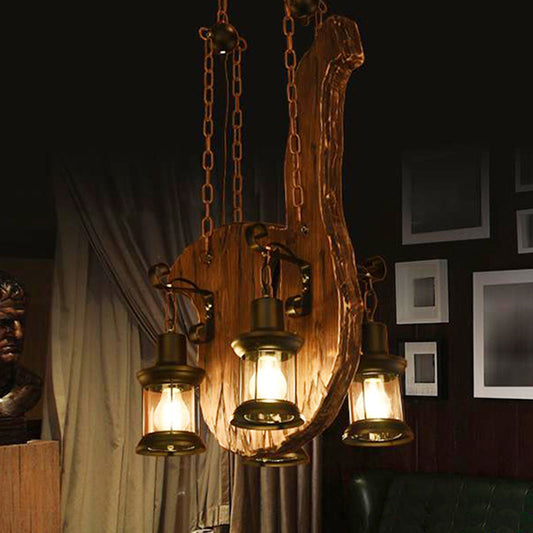 4-Light Lantern Chandelier Industrial Black Clear Glass Pendant Light Fixture with Linear Canopy Clearhalo 'Cast Iron' 'Ceiling Lights' 'Chandeliers' 'Industrial Chandeliers' 'Industrial' 'Metal' 'Middle Century Chandeliers' 'Rustic Chandeliers' 'Tiffany' Lighting' 211187