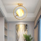 Gold Ball Semi Flush Lighting Modern 1 Light White/Yellow Glass Semi Flush Mount Lamp Fixture with Iron Ring Yellow Clearhalo 'Ceiling Lights' 'Close To Ceiling Lights' 'Close to ceiling' 'Glass shade' 'Glass' 'Semi-flushmount' Lighting' 212409