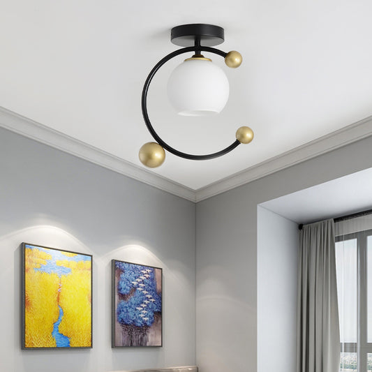 White Glass Sphere Semi Flush Mount Modernist 1 Light Black Semi Flush Mount Light Fixture with Iron Ring, 10"/12" Wide Black 10" Clearhalo 'Ceiling Lights' 'Close To Ceiling Lights' 'Close to ceiling' 'Glass shade' 'Glass' 'Semi-flushmount' Lighting' 212445