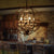 Wrought Iron Spherical Chandelier Pendant Rustic 4-Light Restaurant Hanging Light with Crystal Deco Rust Clearhalo 'Ceiling Lights' 'Chandeliers' Lighting' options 2137874_2025fbe4-2d40-43a5-8cbe-4e6017b54b82