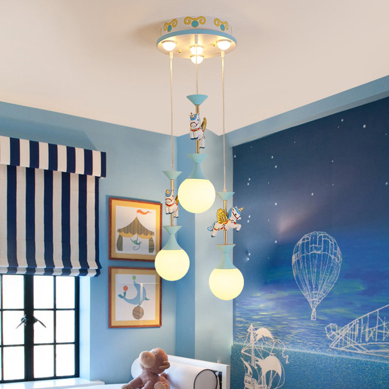 Cartoon Flying Unicorn Multi Light Pendant Resin Kindergarten Hanging Lighting with Sphere Cream Glass Shade 3 Blue Clearhalo 'Ceiling Lights' 'Pendant Lights' 'Pendants' Lighting' 2187791_db7d7bad-cf53-4f73-949e-06e8d1285f48