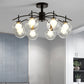 Clear Glass Ball Semi Flush Light Contemporary 3/5/6-Light Living Room Ceiling Flush Mount Chandelier in Black Clearhalo 'Ceiling Lights' 'Close To Ceiling Lights' 'Close to ceiling' 'Glass shade' 'Glass' 'Semi-flushmount' Lighting' 219003