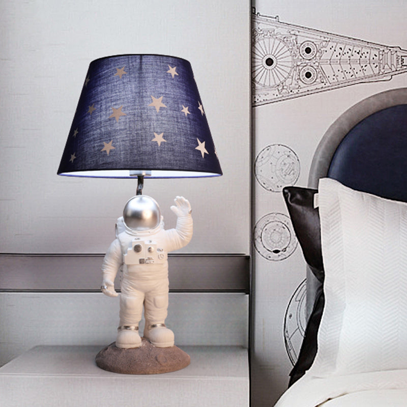 Cartoon Astronaut Table Lighting Resin Single Bedside Nightstand Lamp with Star Patterned Fabric Shade Clearhalo 'Lamps' 'Table Lamps' Lighting' 2197106