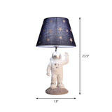 Cartoon Astronaut Table Lighting Resin Single Bedside Nightstand Lamp with Star Patterned Fabric Shade Clearhalo 'Lamps' 'Table Lamps' Lighting' 2197108