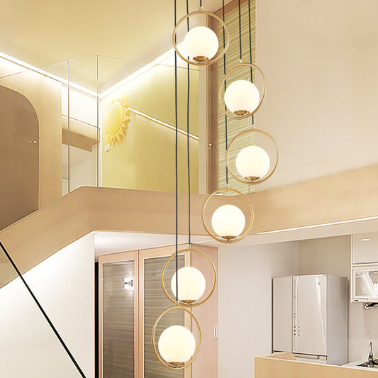 Contemporary Globe Multi Ceiling Lamp Cream Glass Staircase Suspension Light Fixture with Halo Ring in Black 6 Black Clearhalo 'Ceiling Lights' 'Glass shade' 'Glass' 'Modern Pendants' 'Modern' 'Pendant Lights' 'Pendants' Lighting' 2197472