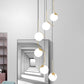 Ball Shade Hanging Lighting Simplicity Opal Glass Staircase Multi Light Pendant in Gold Clearhalo 'Ceiling Lights' 'Glass shade' 'Glass' 'Modern Pendants' 'Modern' 'Pendant Lights' 'Pendants' Lighting' 2197481