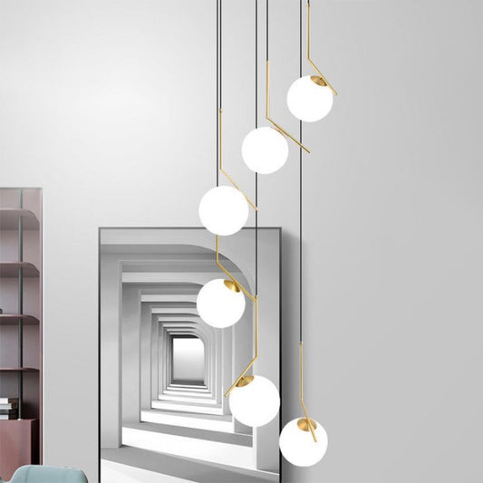 Ball Shade Hanging Lighting Simplicity Opal Glass Staircase Multi Light Pendant in Gold Clearhalo 'Ceiling Lights' 'Glass shade' 'Glass' 'Modern Pendants' 'Modern' 'Pendant Lights' 'Pendants' Lighting' 2197481
