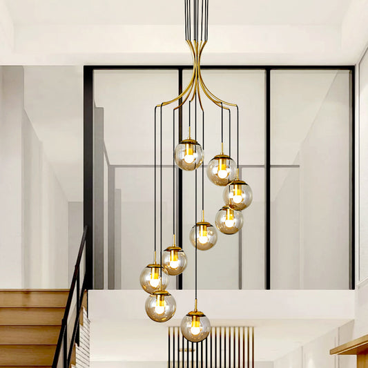 Globe Staircase Multi Ceiling Lamp Frost Glass Contemporary Suspension Light Fixture in Gold 9 Gold Clearhalo 'Ceiling Lights' 'Glass shade' 'Glass' 'Modern Pendants' 'Modern' 'Pendant Lights' 'Pendants' Lighting' 2197505