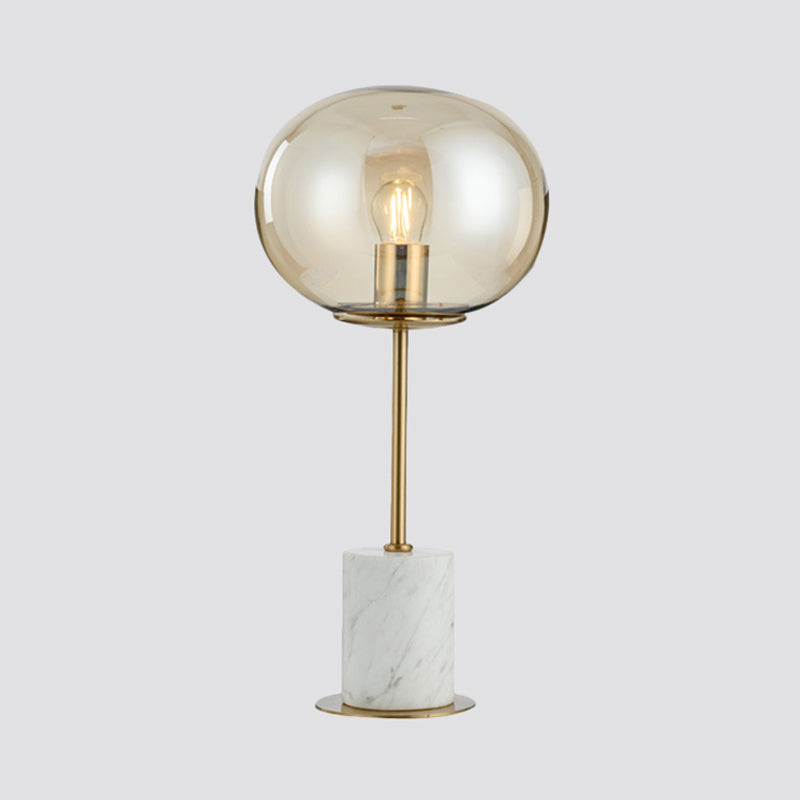 Oblate Bedside Nightstand Lamp Amber Glass 1 Bulb Minimalistic Table Light with Cylindrical Marble Base Clearhalo 'Lamps' 'Table Lamps' Lighting' 2204649